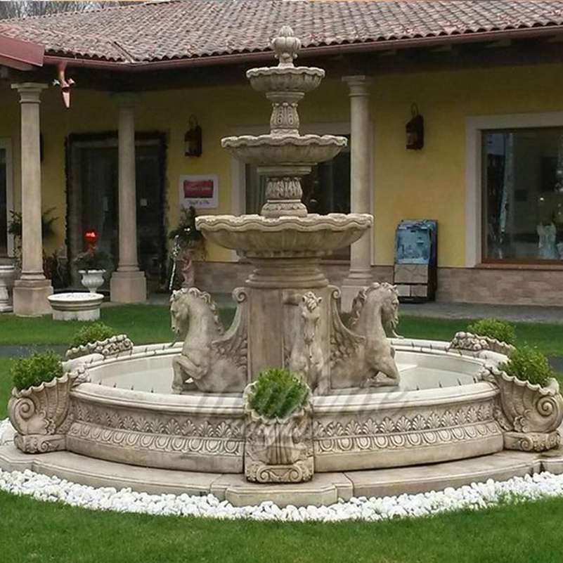 two yellow tiered marble fountain for sale