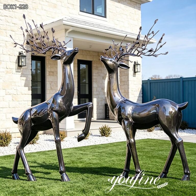 black deer statues