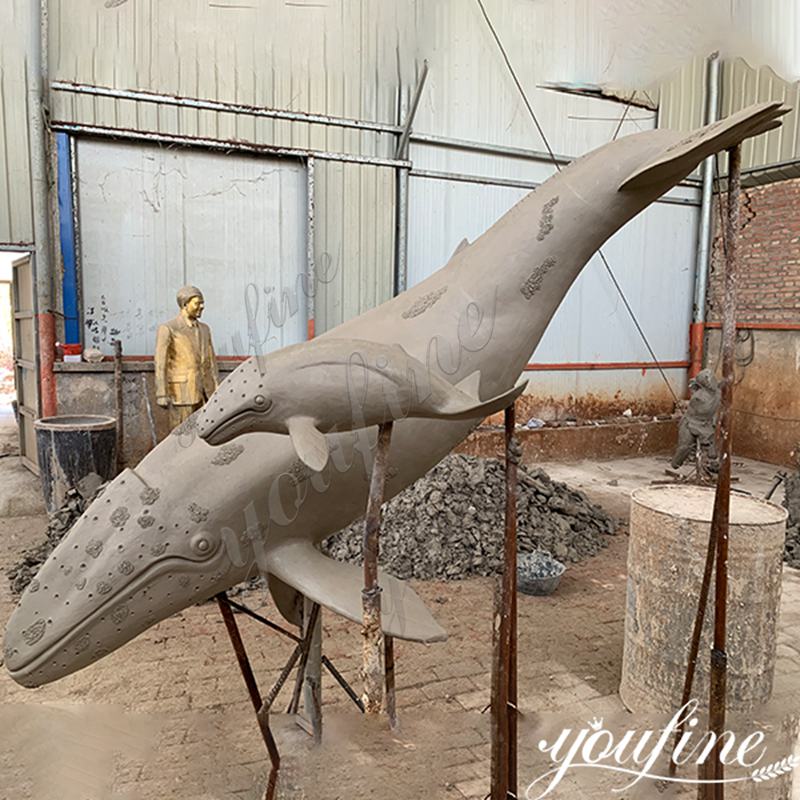 clay model whale statue