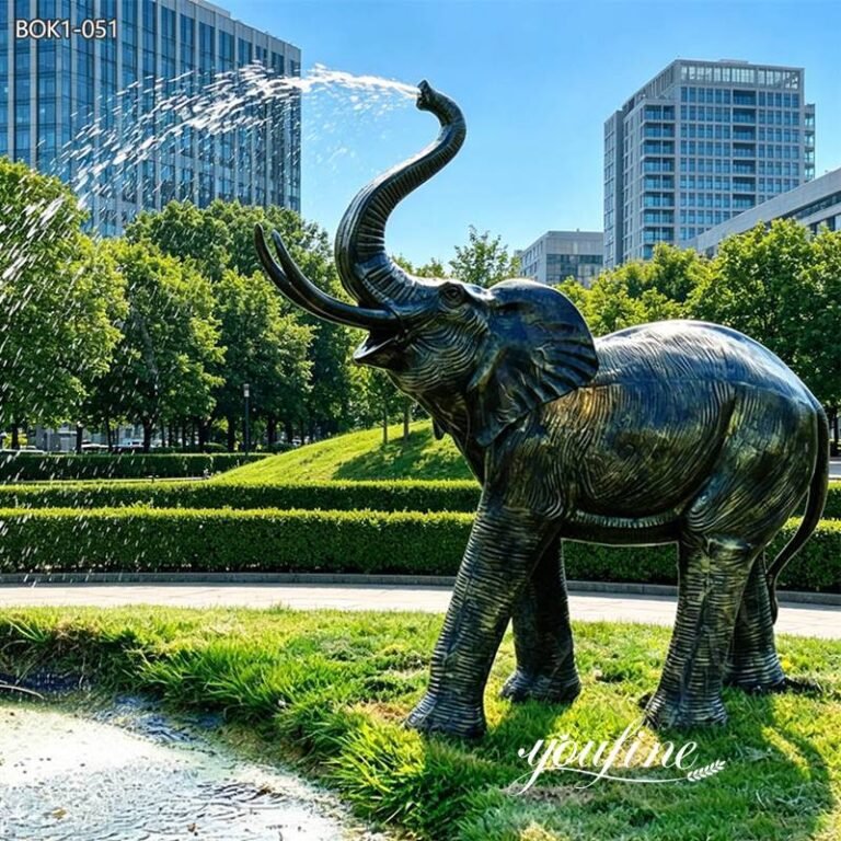 bronze elephant fountain in park