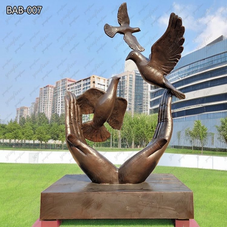 Peace and Love Bronze Bird in Hand Sculpture for Sale